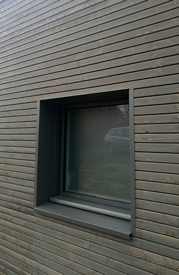 bardage bois saturé pour facade de maison