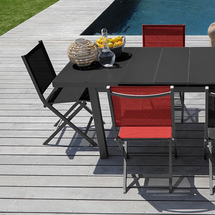 Ensemble salon de jardin 6 personnes - Table extensible Ondine gris - Chaise pliante Théma noir - Alizé Ensemble salon de jardin 6 personnes - Table extensible Ondine gris - Chaise pliante Théma noir - Alizé