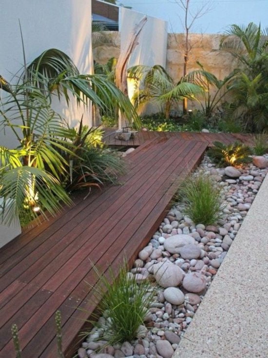 Idéals pour délimiter l’espace entre la terrasse et le reste du jardin, les minéraux apportent un cachet résolument moderne à l’extérieur
